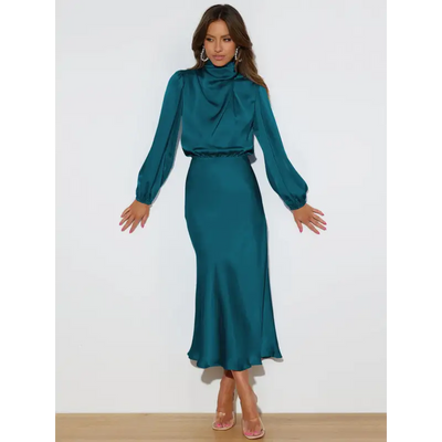 Robe longue femme Joanna™ en satin mat, taille haute, manches lanterne, disponible en plusieurs couleurs élégantes – idéale pour occasions formelles et soirées.