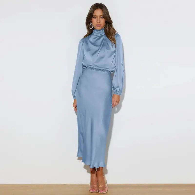 Robe longue femme Joanna™ en satin mat, taille haute, manches lanterne, disponible en plusieurs couleurs élégantes – idéale pour occasions formelles et soirées.