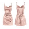 Robe rose douce en satin à dos nu, féminine et délicate, idéale pour un rendez-vous